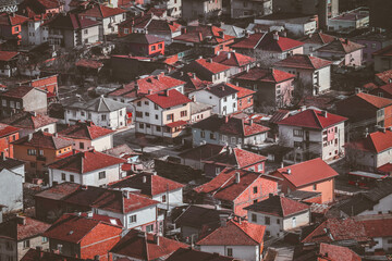 Balkan village architecture landscape. Bulgarian poor region, houses with red roofs.