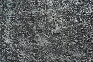 Decorative plaster close up. Texture of concrete wall. Concrete is made in the form of rubbed iron.