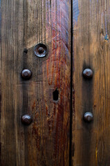 Fototapeta premium fragment of old wooden door textured background