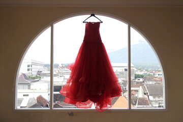 red wedding dress in windows