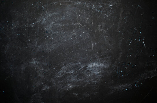 abstract black background with stains from chalk blank for writing information
