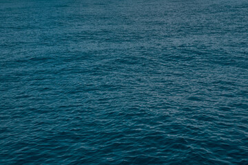 Blue deep sea and little waves