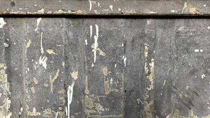 Black metal background with rust and abrasion of paint, raw, rough, rough texture.
