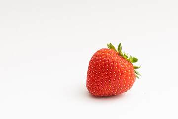 Fresh strawberries were placed on a white background