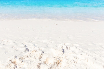 Wave of the sea on the sand beach at Similan islands, Thailand.