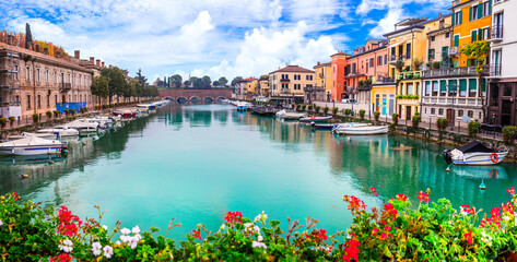 Peschiera del Garda - charming village with colorful houses in beautiful lake Lago di Garda. Verona...