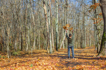 Man playing in the woods