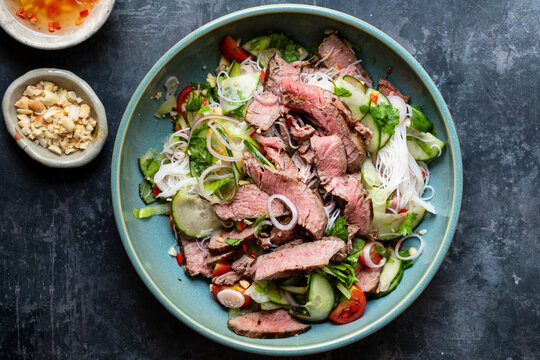 Thai style beef salad with cucumber and peanuts