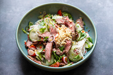 Thai style beef salad with cucumber and peanuts