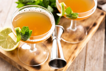 Old Cuban cocktail on wooden table	