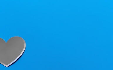 half gray heart on a blue background