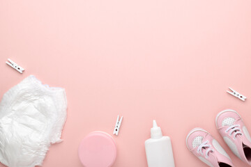 Accessories for the baby on a pink background. Child care.