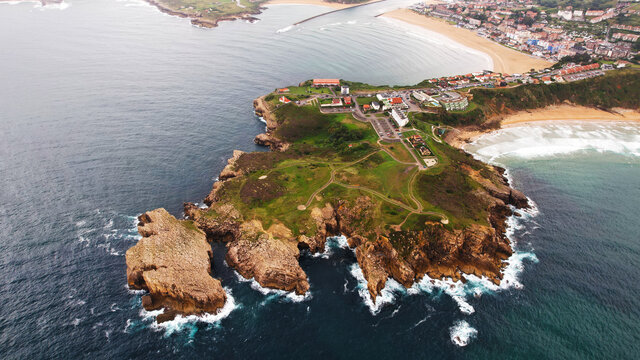 In this imagen you can see Locos Beach in Suances, Cantabria, Spain. Furthermore you can see the cliffs of this town. This town is the paradise of the surfers. 