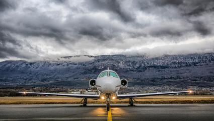 A corporate jet waiting for departure in the alps.
