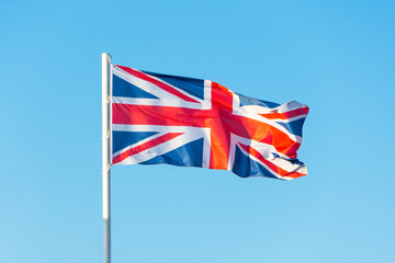 Flag on the blue sky, flag symbols of United Kingdom.
