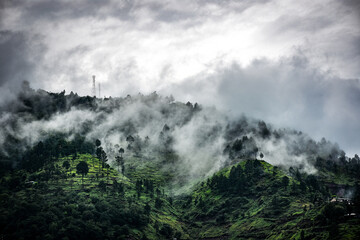 Landscape with mountains and fog