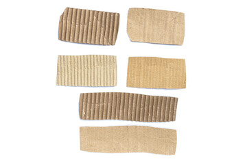 Recycled paper craft stick on a white background. Brown paper torn or ripped pieces of paper isolated on white background.