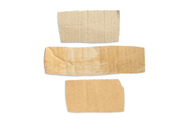 Recycled paper craft stick on a white background. Brown paper torn or ripped pieces of paper isolated on white background.