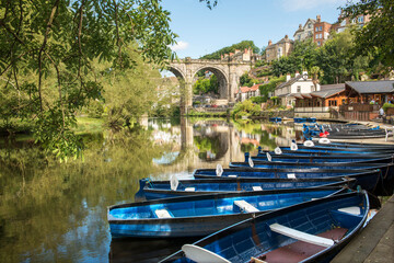 Knaresborough Viaduct in North Yorkshire showing rowing boats on the river