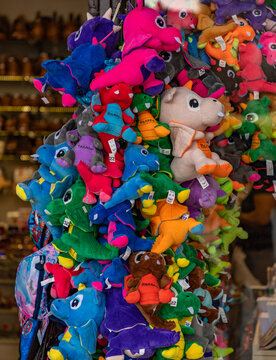 Krakow, Poland - July 21, 2021: A picture of colorful stuffed dragons sold as souvenirs in Krakow.