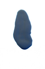 A spot of blue nail polish isolated on a white background. Soft focus