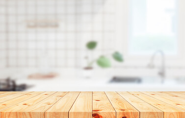 Empty wood table top on blurred kitchen counter background - can be used for display or product display concept.