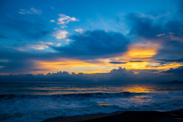  Beautiful sunset over the sea during a storm