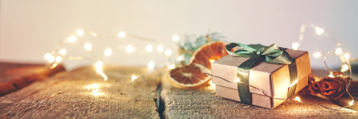 Christmas background zero waste, eco friendly gift wrapping craft paper fir branches, gift basket, cozy winter winter evening Christmas Eve, ecological concept eco-friendly banner decor xmas banner.