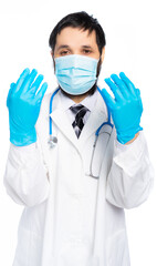 man in a white medical coat. portrait. isolated white background. doctor in mask and rubber gloves is ready for surgery. disinfected hands