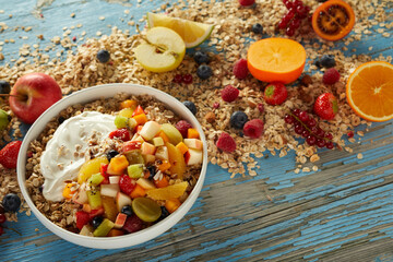 Appetizing breakfast bowl on wooden table