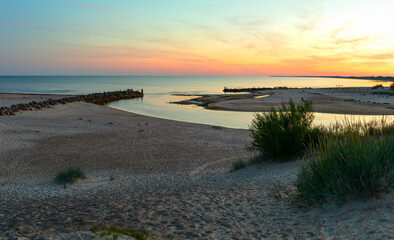 Old wooden pier early in the morning.