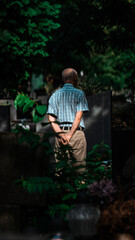 A man praying in a cmentary