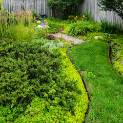 Manicured residential formal garden and lawn