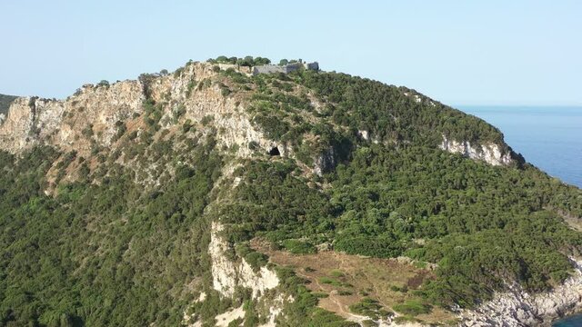 Aerial view of Palaiokastro (Old Navarino) castle with solitary visitor, near Pylos, Greece, Europe