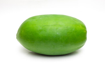 Organic raw green papaya fruit on isolated white background