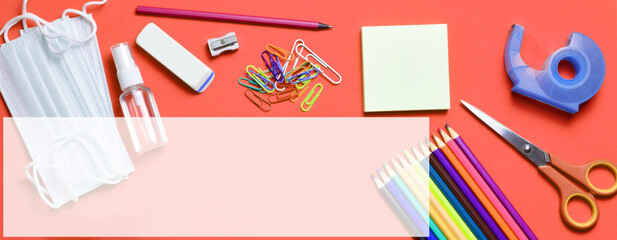 Rectangular poster, varied school supplies, back to school, with a mask and hand gel. Reserved space with transparency for text or idea.