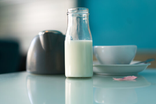 Close-up Of Milk Bottle On A Table