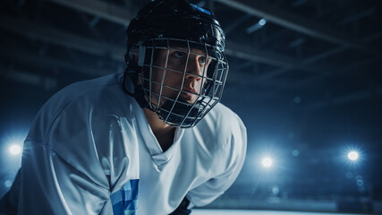 Ice Hockey Rink Arena: Confident Professional Player Ready for Faceoff and Match Start. Portrait of...