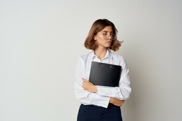cheerful woman manager in white shirt documents work professional