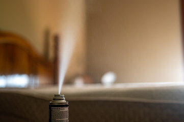 Selective focus on insect insecticide aerosol can fogger used to kill bed bugs, spiders, mites, flies, and fleas