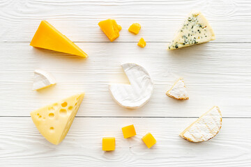 Layout of various types of cheese. Dairy products flat lay