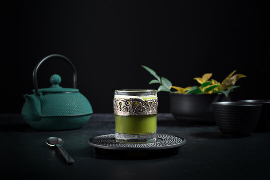 Glass with green matcha tea