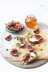 Bruschetta with cottage cheese ,fig slices and honey.