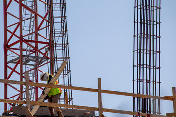 Unrecognizable construction workers on the construction site in Denver, Colorado