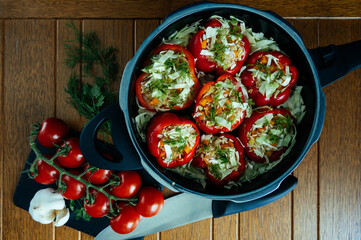 Vegetarian Food photography stuffed peppers with rice, carrots and cabbage. Image for recipe books, menus and food magazines.