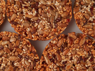 Homemade oatmeal cookies folded in a pile on the old table
