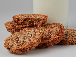 Homemade oatmeal cookies folded in a pile on the old table