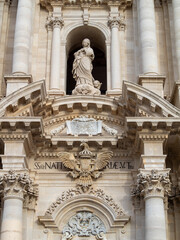 Cathedral of Syracuse facade detail with Virgin Mary statue