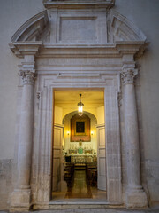 Chiesa San Paolo Apostolo with open doors at night