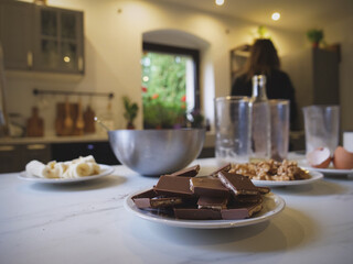 Woman cooking a chocolate cake in kitchen